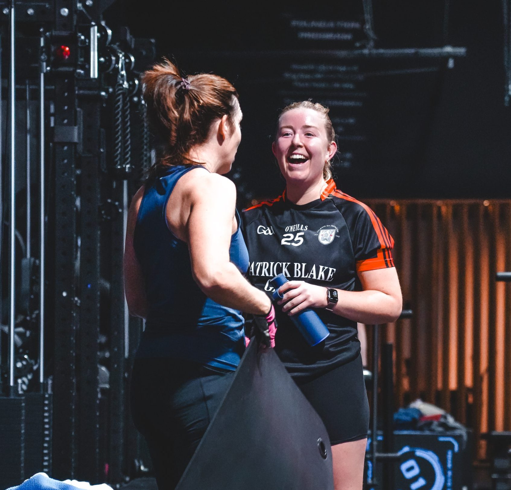Happy Personal Training Clients In Gym